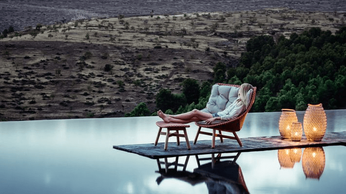 Mbrace wing chair by DEDON