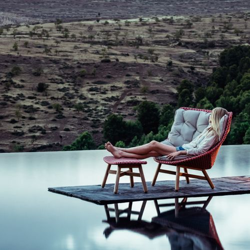 Mbrace wing chair by DEDON