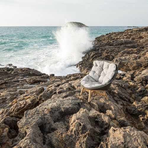 Mbrace wing chair by DEDON