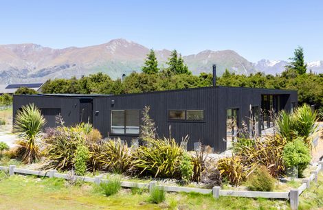 A jet-black mountain home protected by CUTEK® Extreme Oil