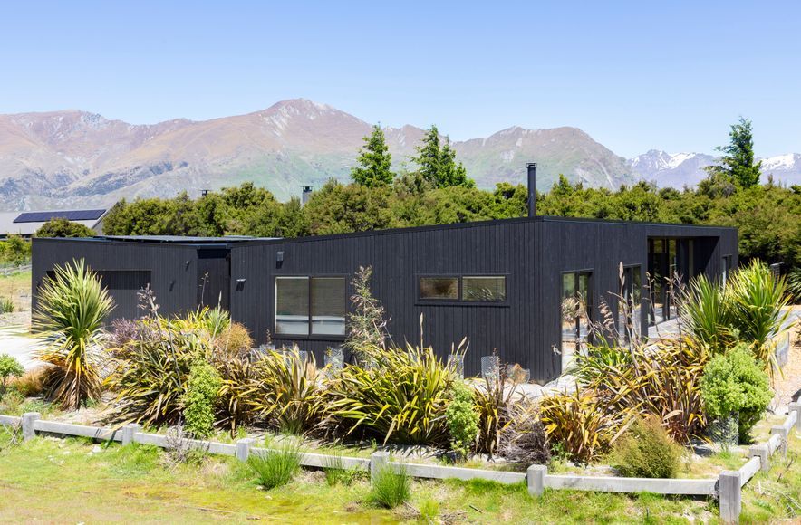 A jet-black mountain home protected by CUTEK® Extreme Oil