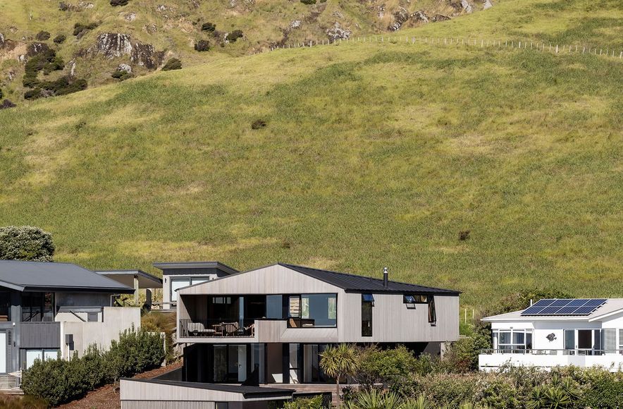 A richly textured beach home with views from hill to horizon
