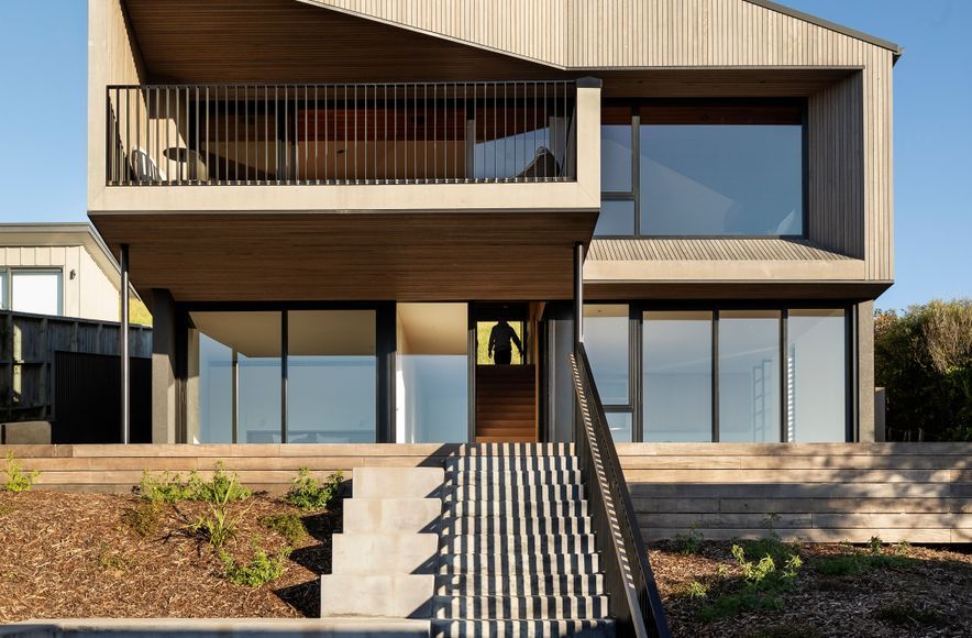 A richly textured beach home with views from hill to horizon