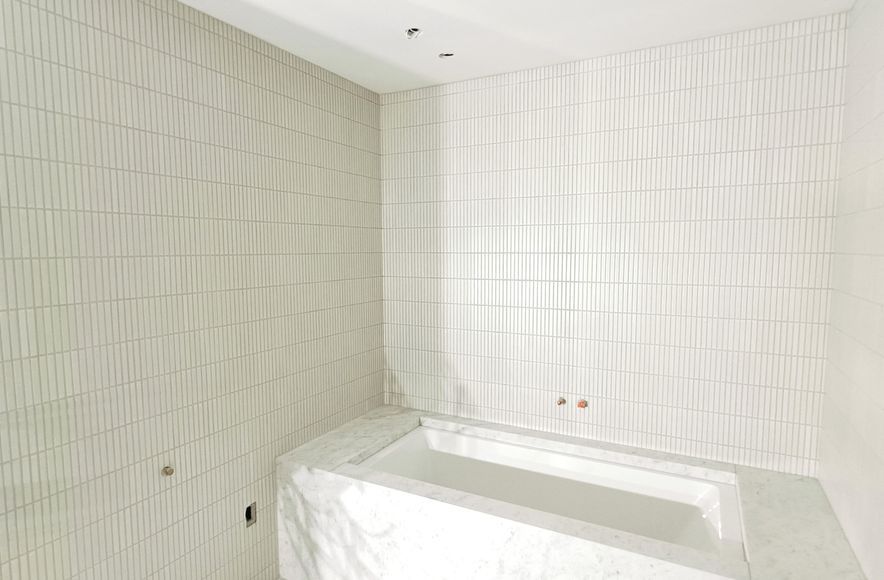 Damn Good Tiling - finger mosaic wall