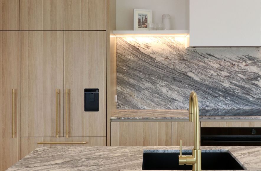 Curved Timber Island with Leathered Granite Elegance
