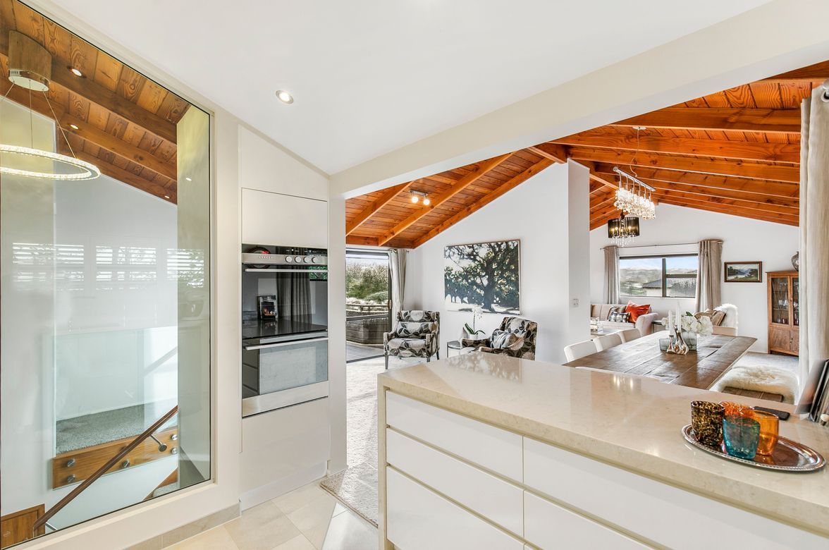 “From Stairs to Storage: How Recessing a Wall Oven can Transform the Kitchen”