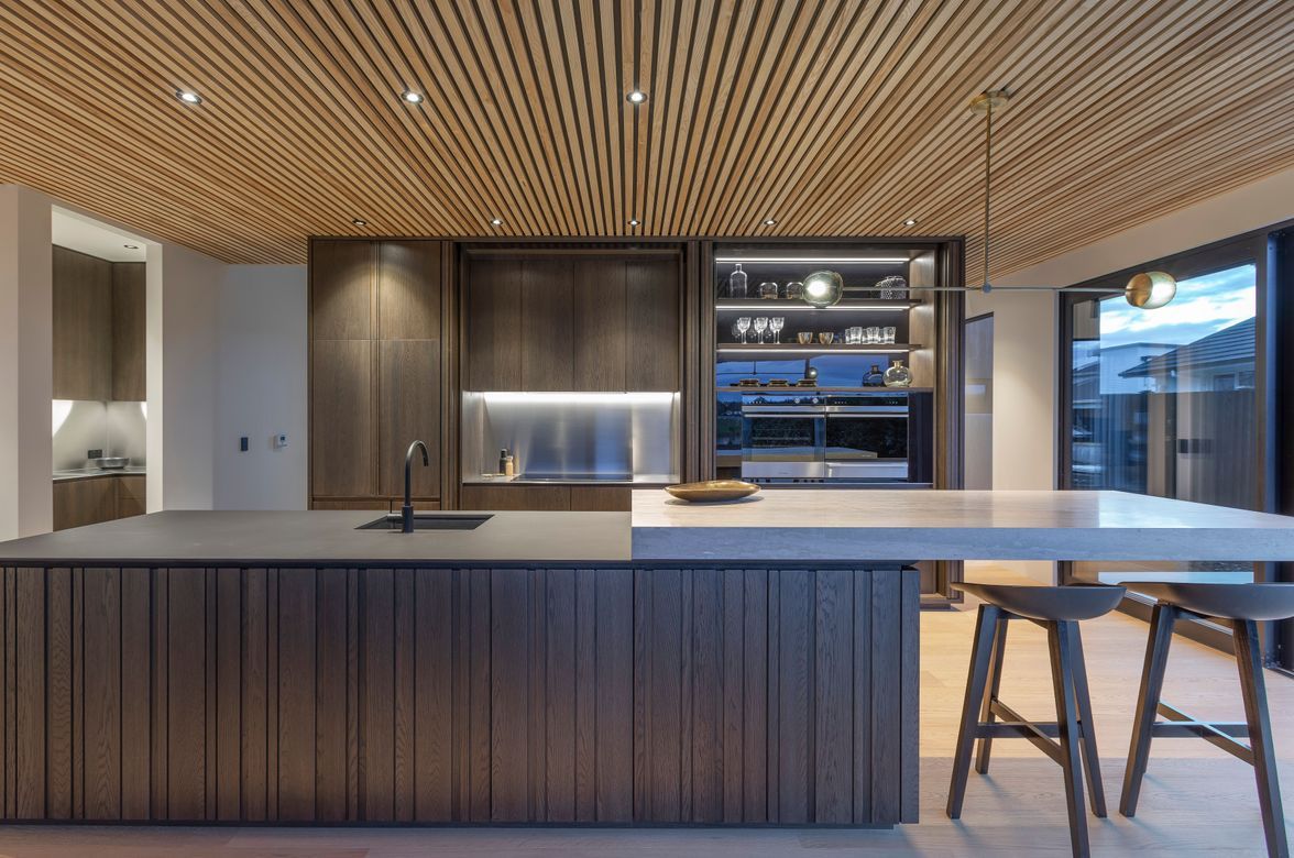 Dramatic kitchen with handleless design in a rural setting