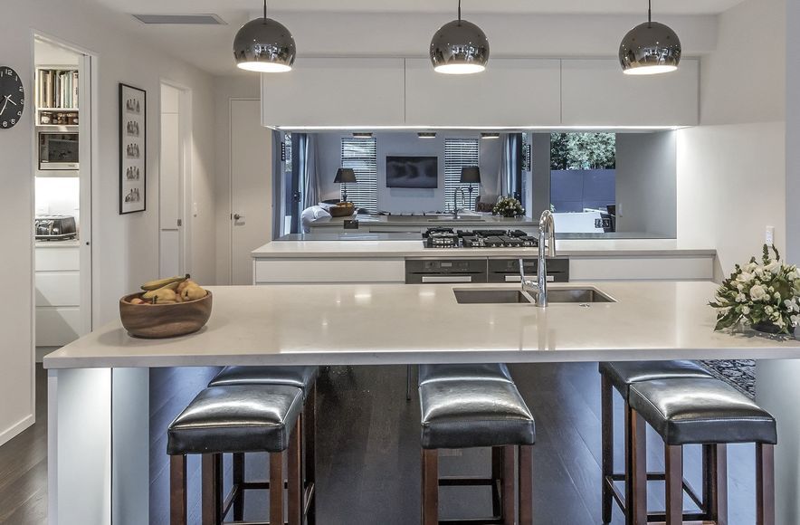Stylish Kitchen Uses Hidden Handles