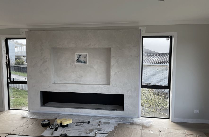 Resistone microcement fireplace