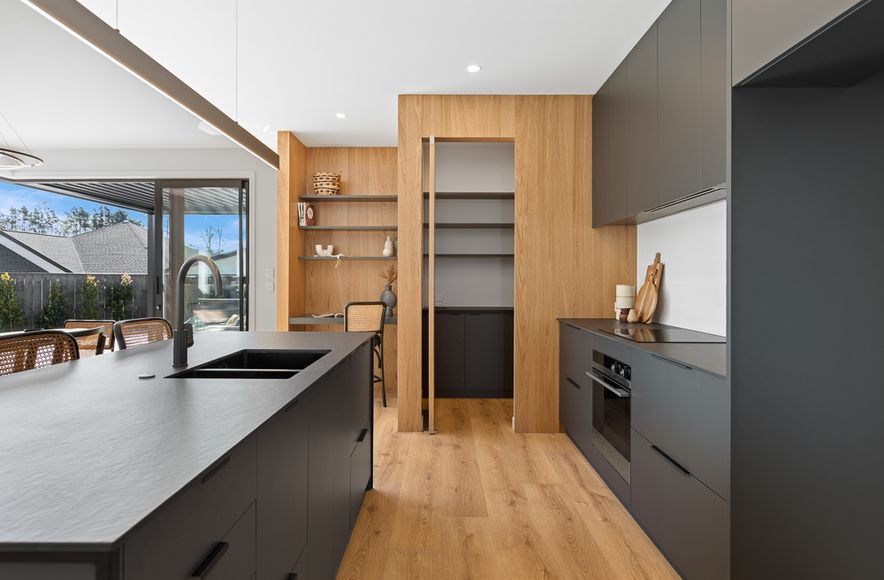 Black steel Kitchen Island with Dekton + Oak