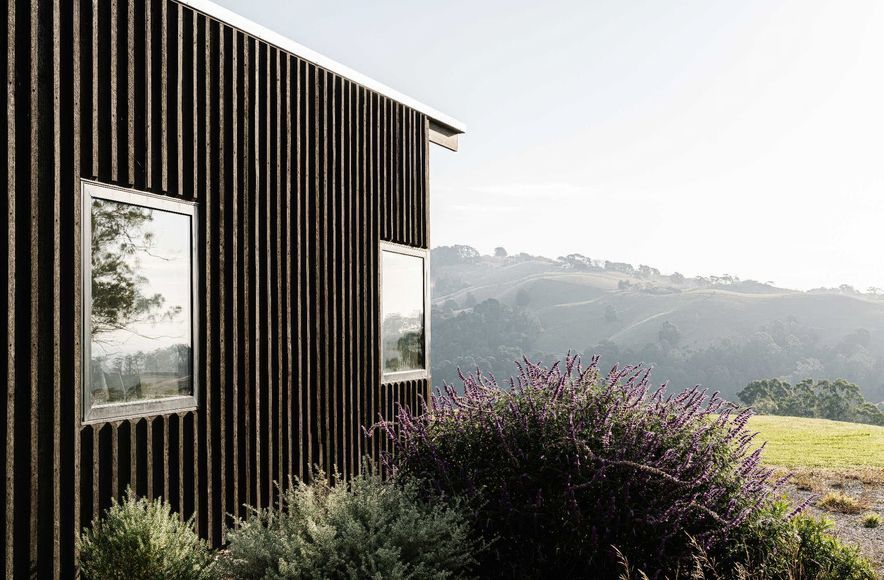 CUTEK® protects and enhances the natural beauty of Yellow Stringybark cladding on this West Gippsland barn-style home, using CUTEK® Extreme CD50 and Black Ash Colourtone
