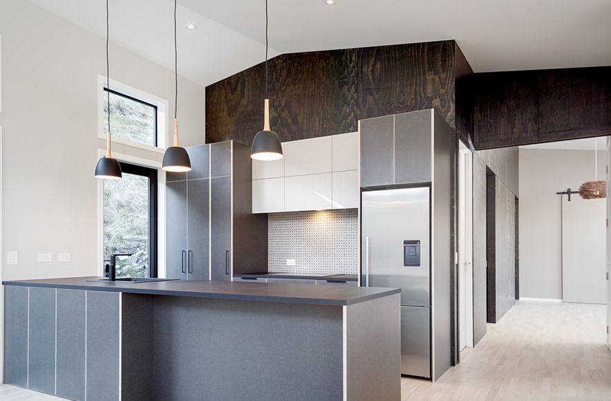 A striking feature wall in black satin plywood