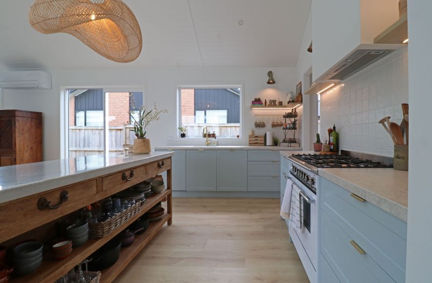 Kitchen in Blues with a French Country Island
